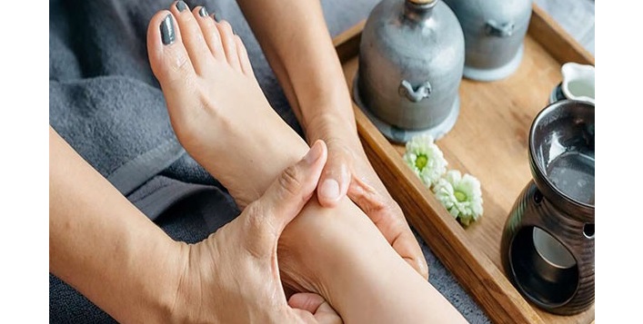 Foot reflexology with pedicure